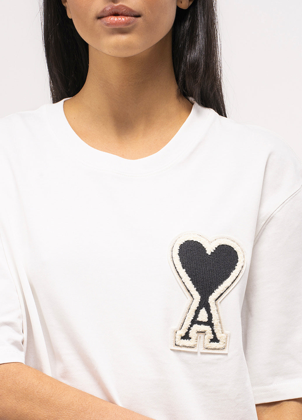 White t shirt with black sales heart